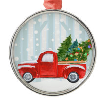 Röd pickup lastbil för jul på en snöig väg