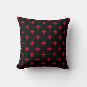 Röd polka kor på svart kudde