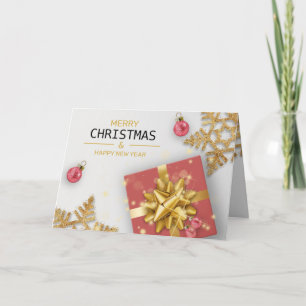 Röd presentlåda julgranskulor guld snöflingor kort