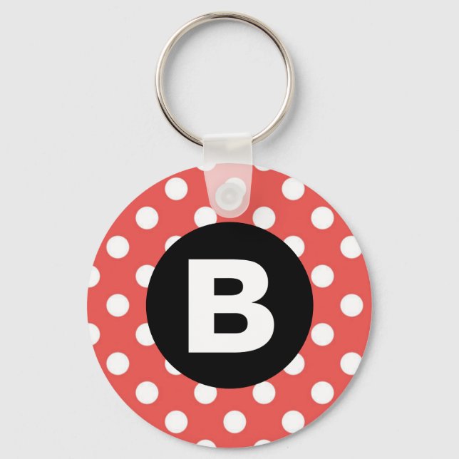 Röd prickig mönster svart monogram nyckelring (Framsida)