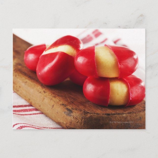 Röd randig teahandduk i bakgrund vykort (Framsida)