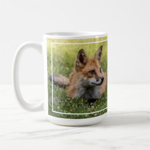 Röd räv på en bed från Klöver Kaffemugg