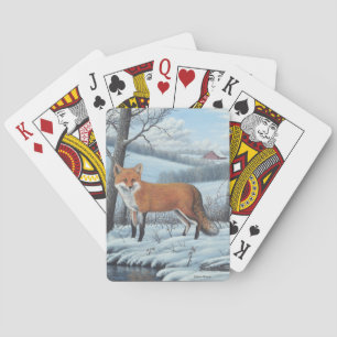 Röd räv som leker kort casinokort