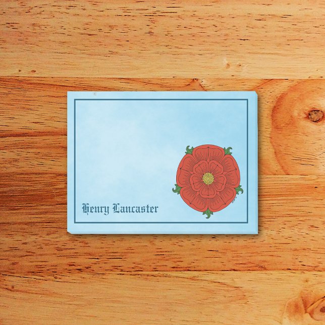 Röd ros i Lancaster Post-it Block (Red Rose of Lancaster Post-it Notes Pad on Desk)