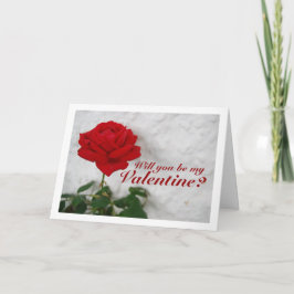 Röd ros mot vit vägg kort