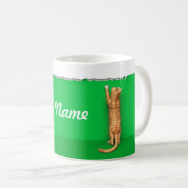 Röd tabby katt river papper kaffemugg