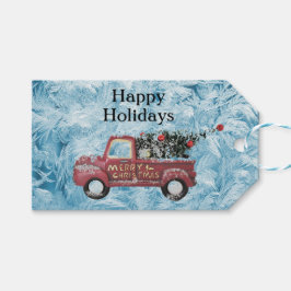 röd vintage lastbil på en blå snöflingbakgrund presentetikett