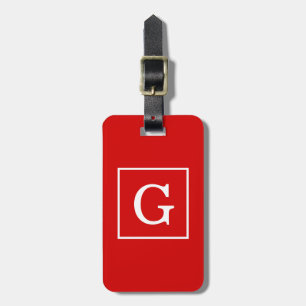 Röd vit ramad initialmonogram bagagebricka