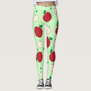 Röda äpplen och halverade äppelskinn leggings