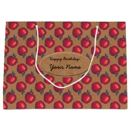 Röda äpplen på bruntpappersetikett