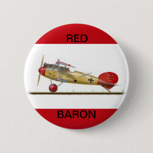 Röda baronflygplan på rund knapp