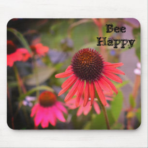 Röda blommor vid RHS Wisley Bee Lycklig Musmatta