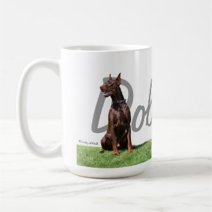 Röda DobermanPinschers med den grafiska muggen f Kaffemugg