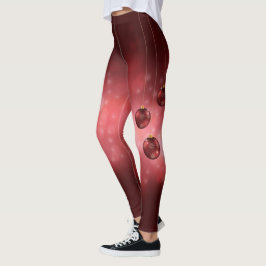 Röda festliga julgranskulor på röd bokeh leggings