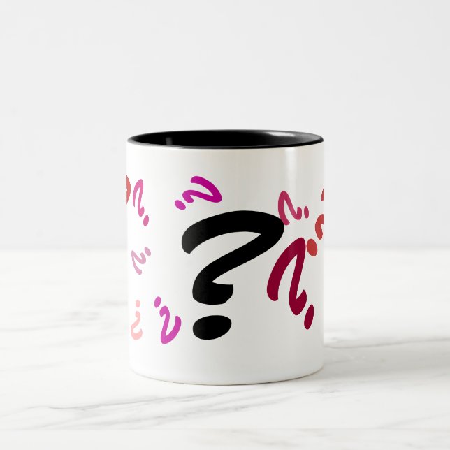 Röda frågetecken mellan mugg och Många (Center)