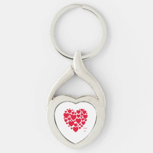 Röda hjärtan, gåva twisted heart silverfärgad nyckelring