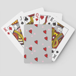 Röda hjärtan på grått casinokort