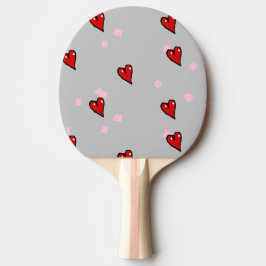 Röda hjärtan på grått pingisracket