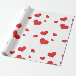 Röda hjärtan som omsluter pappra presentpapper