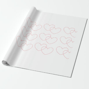 Röda Interlocking hjärtor som slår in papper Presentpapper