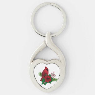Röda kardinaler på julens dekoration twisted heart silverfärgad nyckelring
