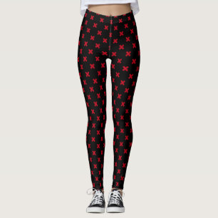 Röda kor stygn på svart leggings
