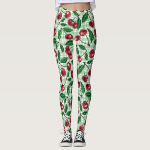 Röda körsbär på ljust grönt gingham leggings