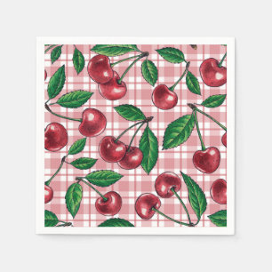 Röda körsbär på rosa gingham pappersservett