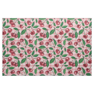 Röda körsbär på rosa gingham tyg