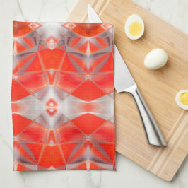 Röda kurvformar som flyter över vitt grått kökshandduk