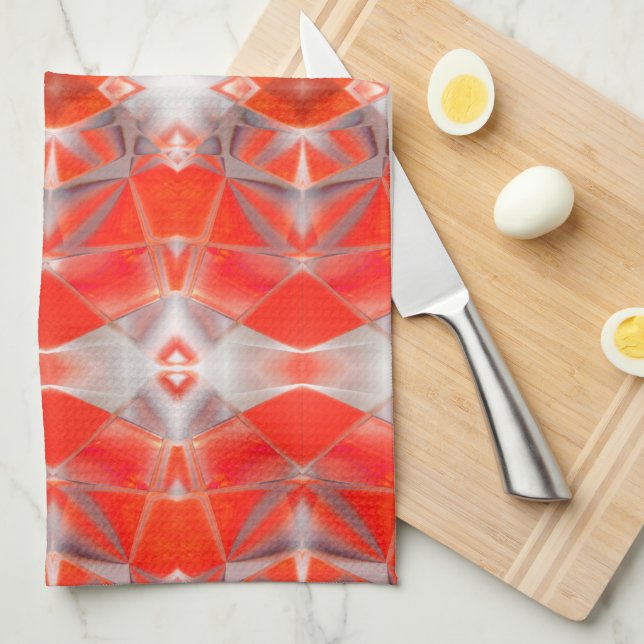 Röda kurvformar som flyter över vitt grått kökshandduk (Vikt i Fjärdedel)