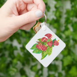 Röda mjältblommor nyckelring