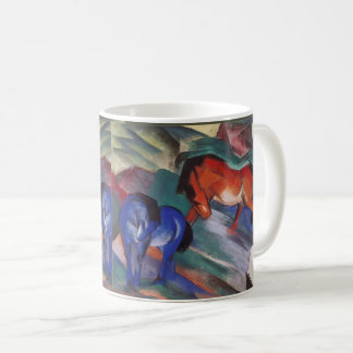 Röda och blå hästar kaffemugg