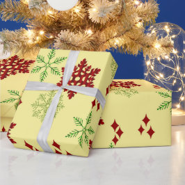 Röda och gröna julsnöflingor presentpapper