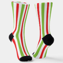 Röda och gröna jultryckta strumpor