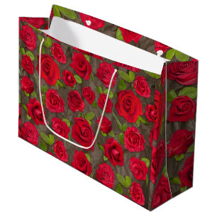 Röda och mörkt rosa blommande rosor mönster