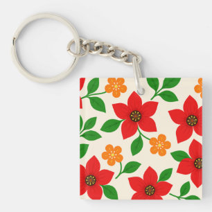 Röda och orange blommor med gröna blad