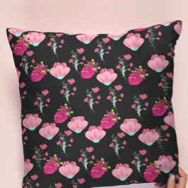 Röda och rosa blommor mönster på svart kudde