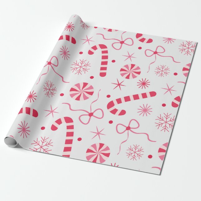 Röda och rosa julgodis med slingor och snö presentpapper (Utrullad)
