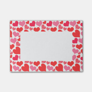 Röda och rosa valentin daghjärtor för kärlek post-it block