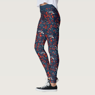 Röda och vita julblommor på mörk blått Leggi Leggings