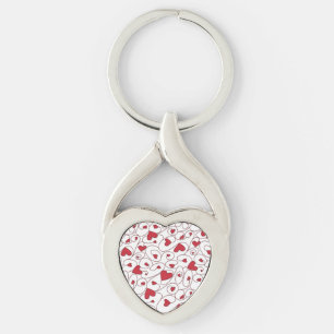 Röda och vita kryddhjärtan twisted heart silverfärgad nyckelring