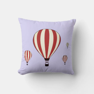 Röda och vita varmluftsballonger på periwinkle kudde