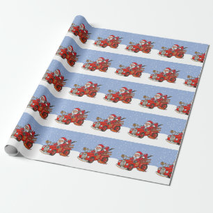 Röda Santa avfyrar lastbilhelgdag som slår in Presentpapper