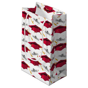 Röda Studentmössor med examensbevis