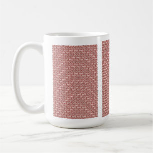 Röda textilier och rosa som lagts över ett skyddat kaffemugg