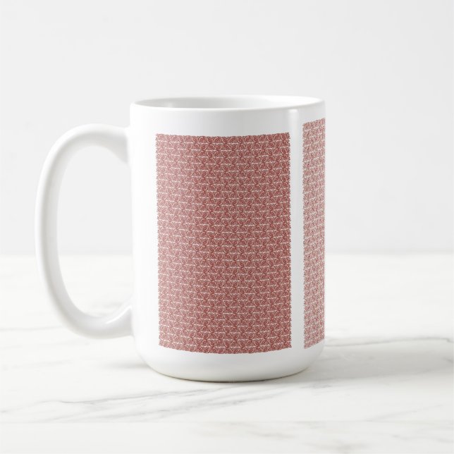 Röda textilier och rosa som lagts över ett skyddat kaffemugg (Vänster)