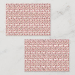 Röda textilier och rosa som lagts över ett skyddat tidsbeställning kort