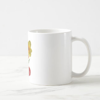 Röda tulpaner och gula narcissblommor kaffemugg
