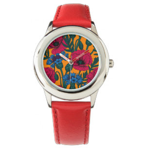 Röda vallmo och blåkornblommor på orangen armbandsur